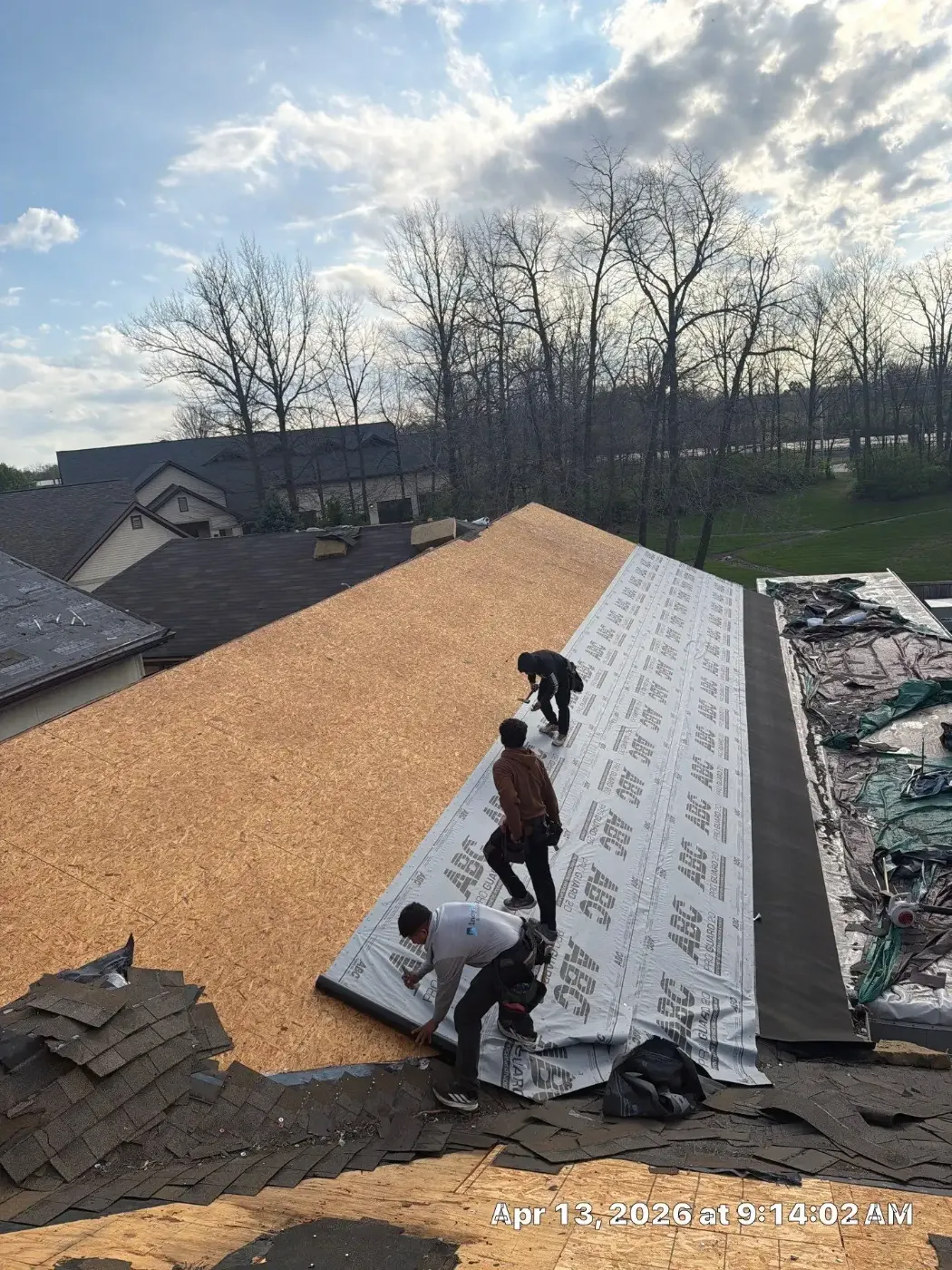 Tarping and dry-in on a Beech Grove commercial roof